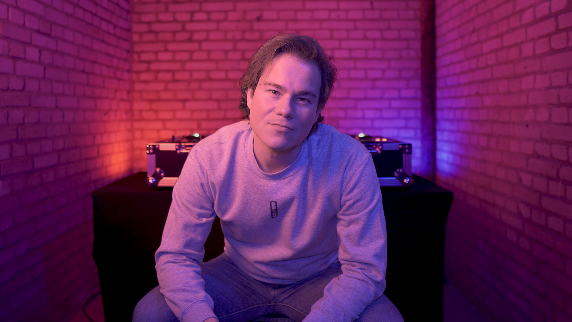 Aviøthic performing a live Shelter Sessions set, blending industrial groove and techno, with dark, pulsing beats filling the bunker as the crowd moves to the rhythm.